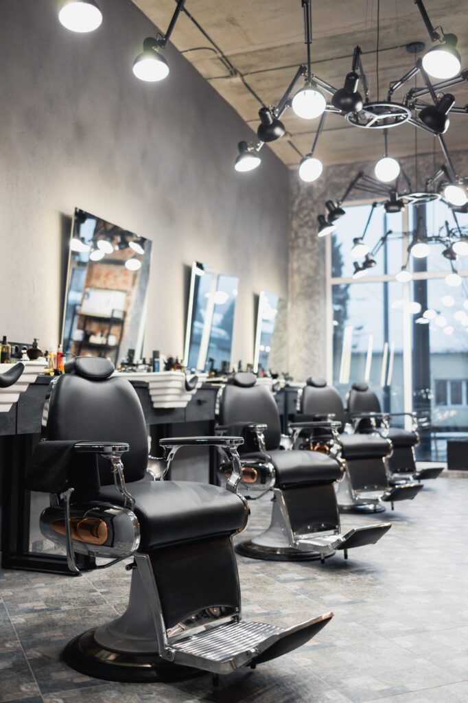 Row of empty chairs in a barbershop